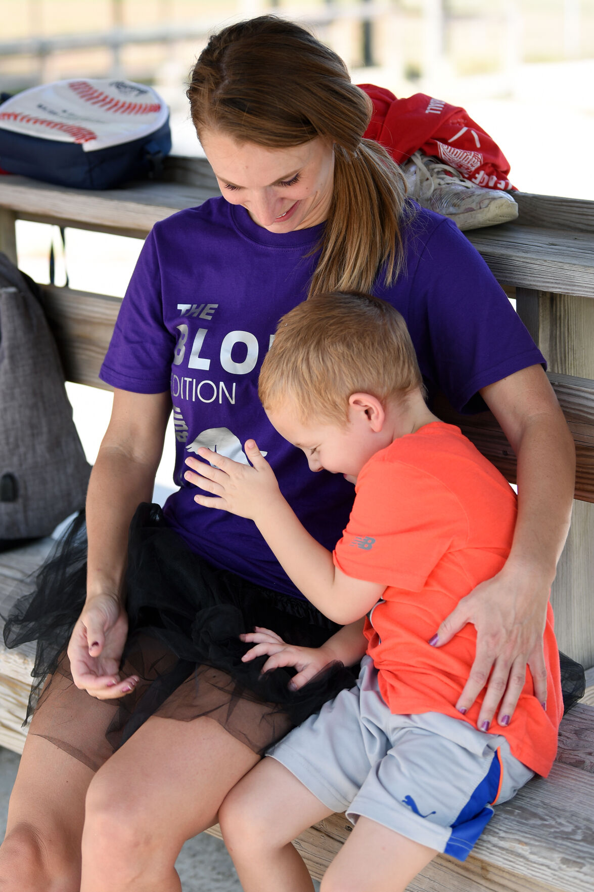 Elise Ridenhour asks her son Grayson Ridenhour, 4, if he wants to play